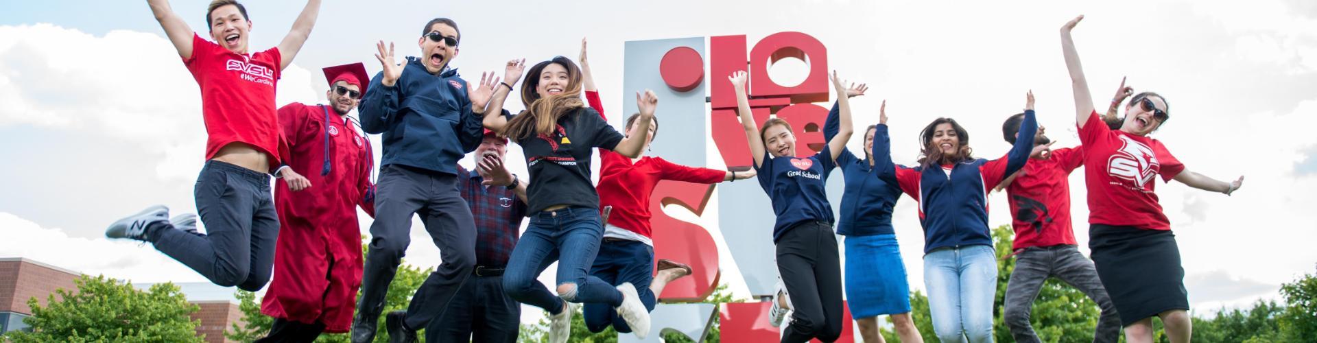 Students Jumping into the air